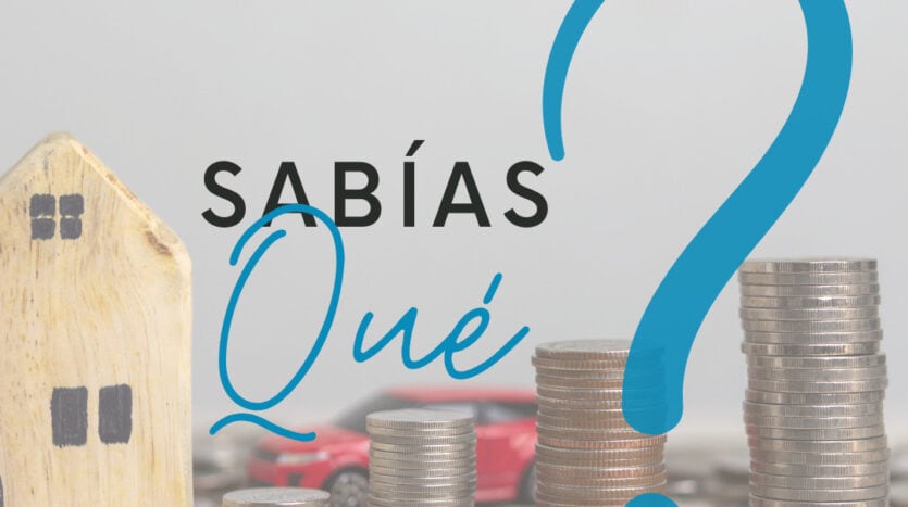 Image maqueta de una casa y monedas apiladas