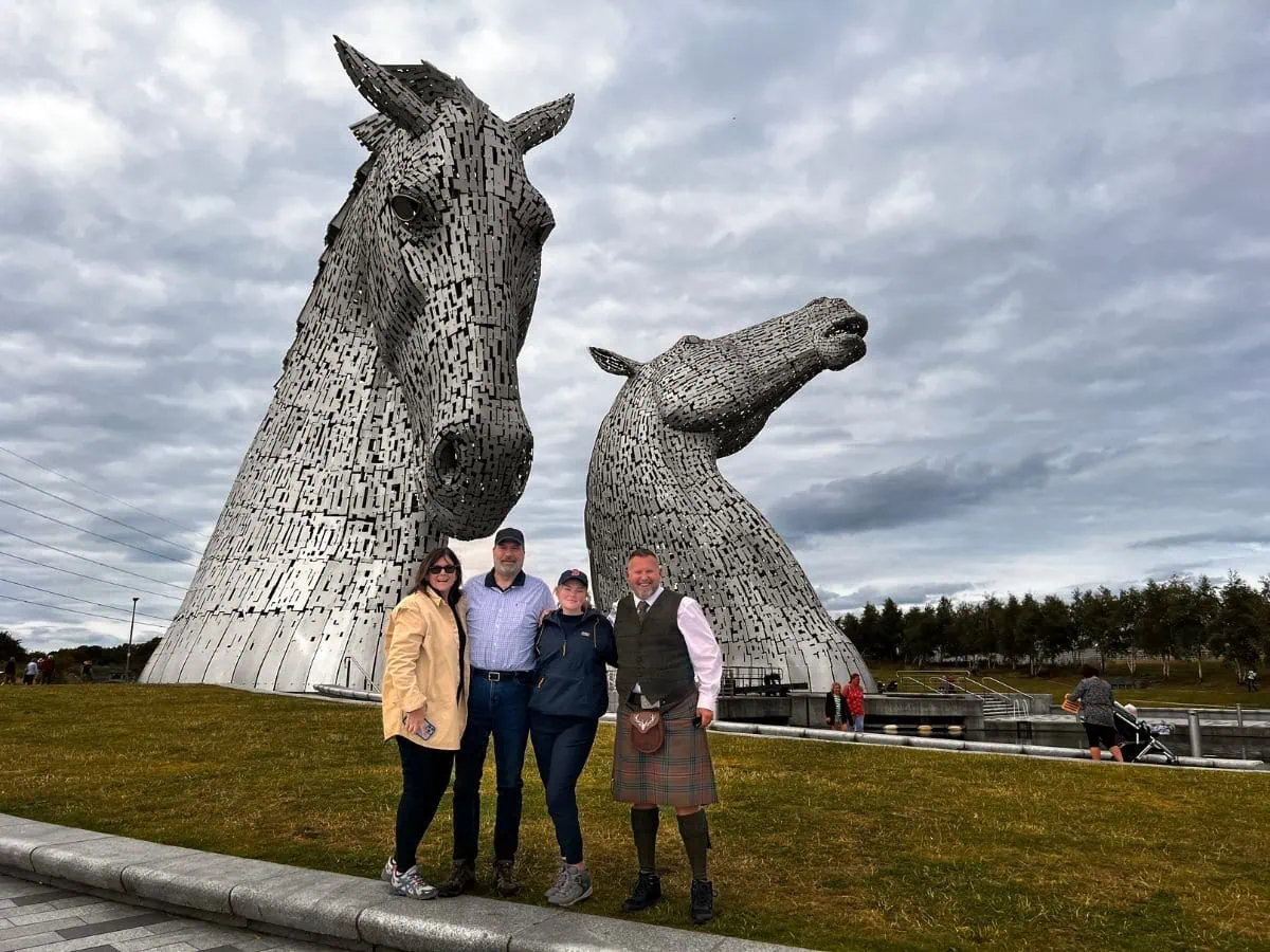 The Kelpies with some clients & James Kennedy on a Kelpies and Falkirk Wheel day tour from Glasgow with Tour Guide Scotland
