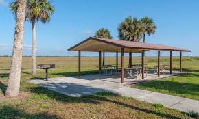 Picnic tables at Three Forks Conservation Area near Palm Bay Florida