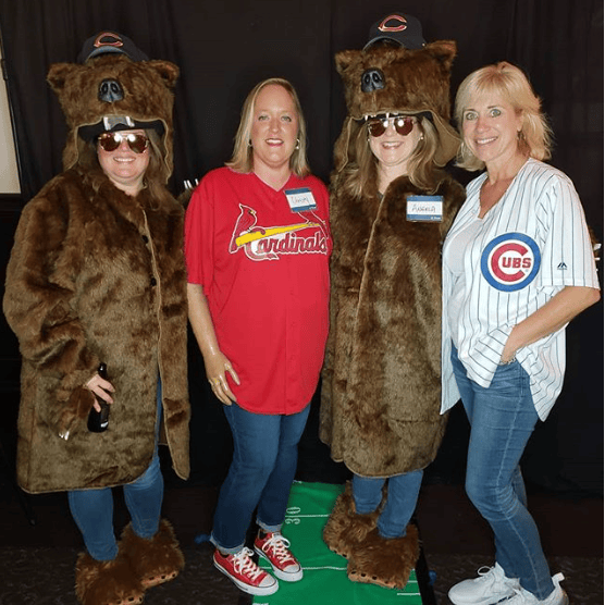 Group of friends in playful bear costumes.