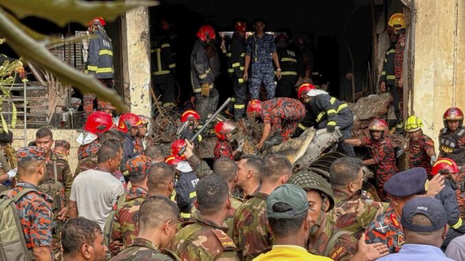 A Bangladesh Air Force training jet crashes into a Dhaka school, killing at least 19