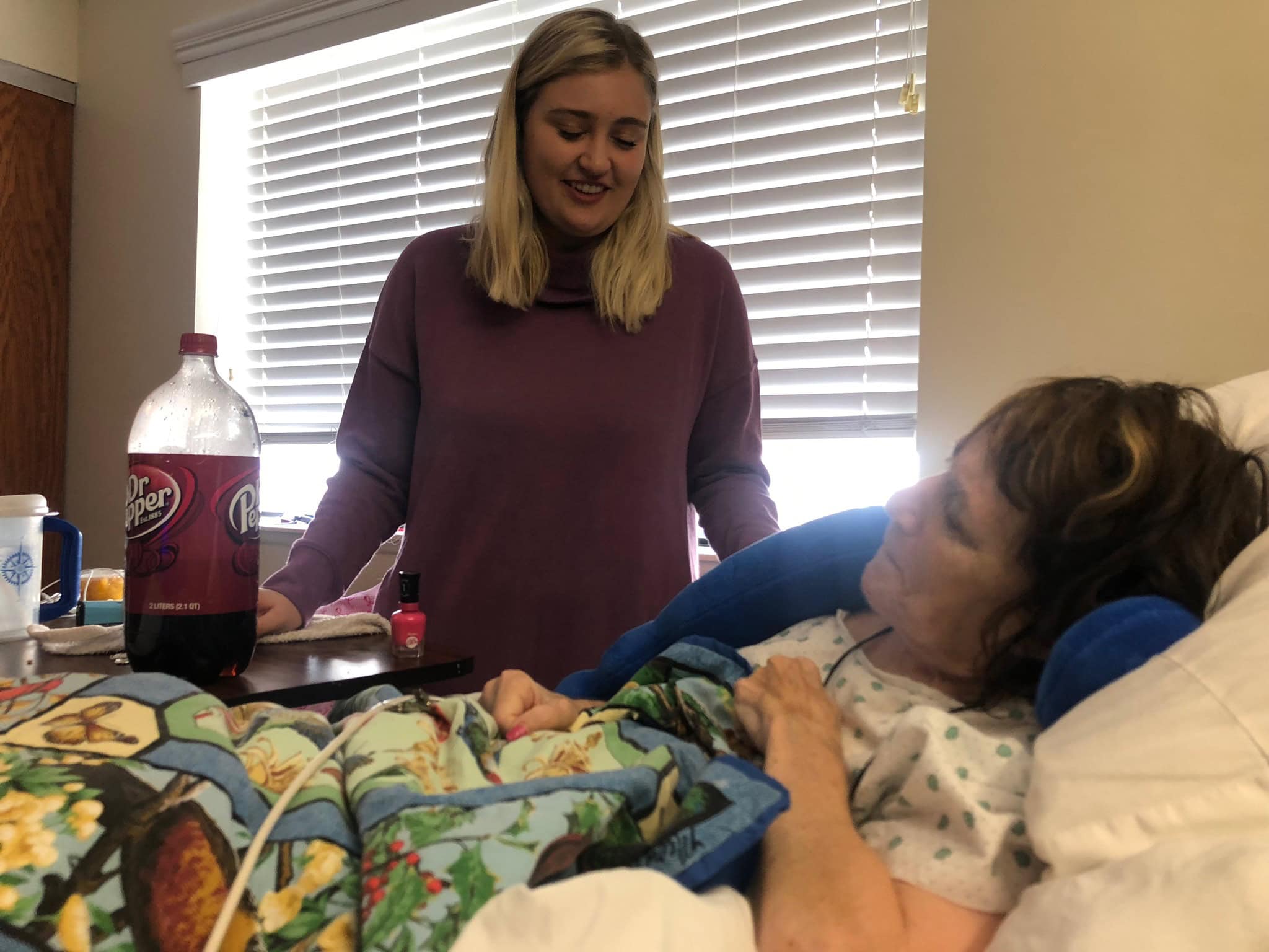 Christy's daughter visiting her grandmother in the hospital