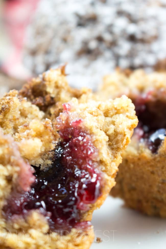 Whole-Wheat Jam Doughnut Muffins - A perfect way to start your morning these healthy layered muffins are bursting with flavor! Vegetarian too!!