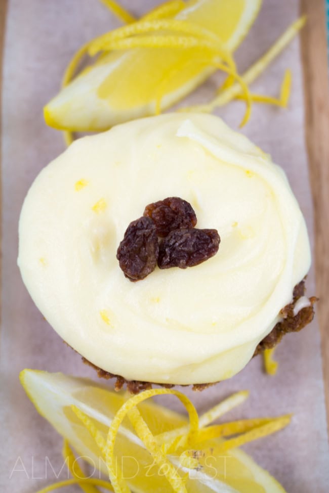 Tangy Lemon Slice - Thick soft fruity flavored base with a tangy lemon frosting! Easy to make with no mixer required!! Must.Make.Now. | almondtozest.com