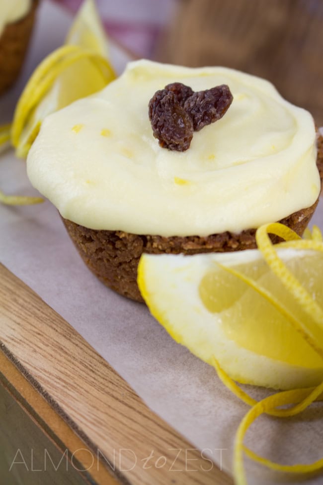 Tangy Lemon Slice - Thick soft fruity flavored base with a tangy lemon frosting! Easy to make with no mixer required!! Must.Make.Now. | almondtozest.com