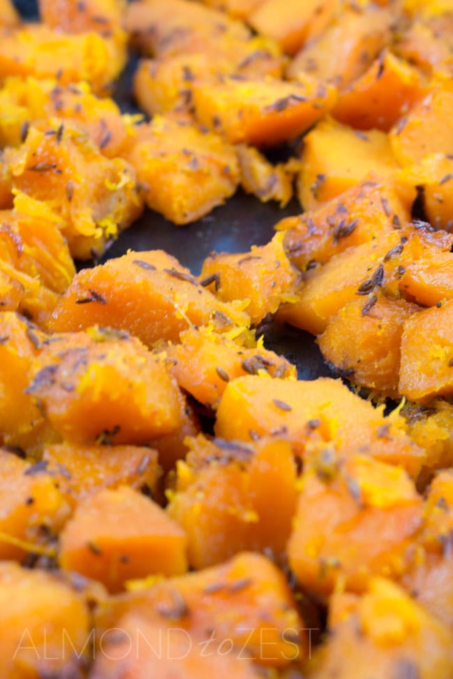 Roast Pumpkin Chunks - A quick and easy roast pumpkin recipe that can be used in countless recipes! Nutty and peppery flavors of the cumin seeds penetrate the flesh of the pumpkin to give it a more complex flavor!!