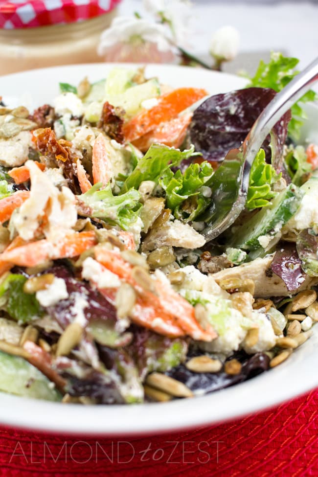 Herb Roasted Chicken Salad - Super healthy, easy and packed with protein! Roast chicken breast, mixed salad, chunks of creamy feta, sunflower seeds and sundried tomatoes!!