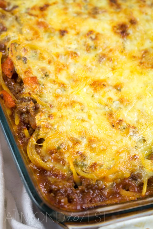 Spaghetti Bolognaise Bake - This spag bol bake will become a family favorite loaded with flavor, a creamy texture and a crispy golden cheese layer! YUM!!