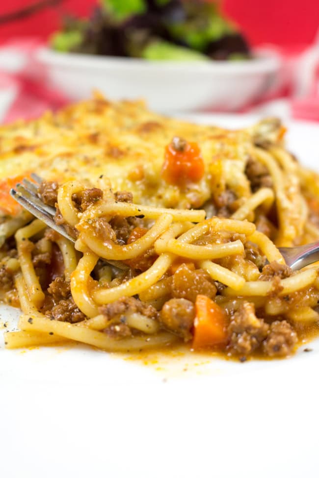 Spaghetti Bolognaise Bake - This spag bol bake will become a family favorite loaded with flavor, a creamy texture and a crispy golden cheese layer! YUM!!