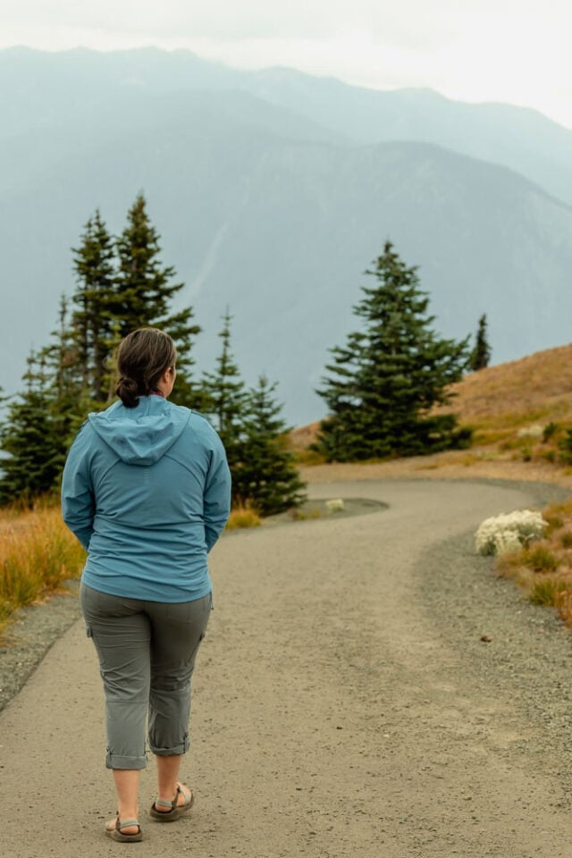 13 Olympic National Park Hikes | with map + trail information Olympic National Park Hikes, ArboursAbroad, woman hiking with mountains, Washington