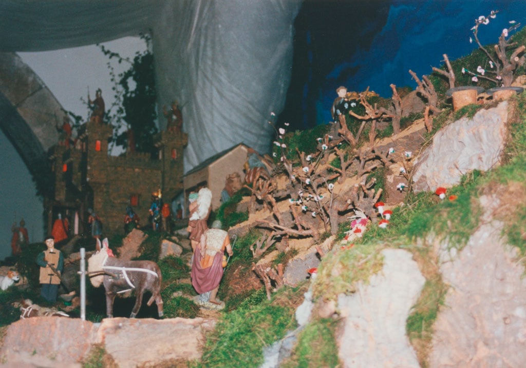 El cazador junto a la noria y la viña.