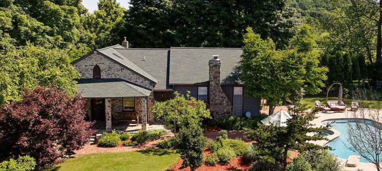 roof repair on stone veneer house