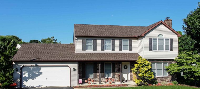 roof repair on brown shingles