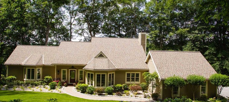 shingle roofing on a big house