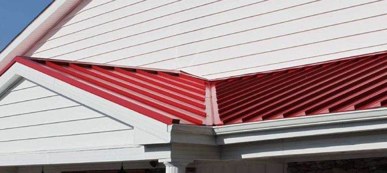 red metal roof with white siding