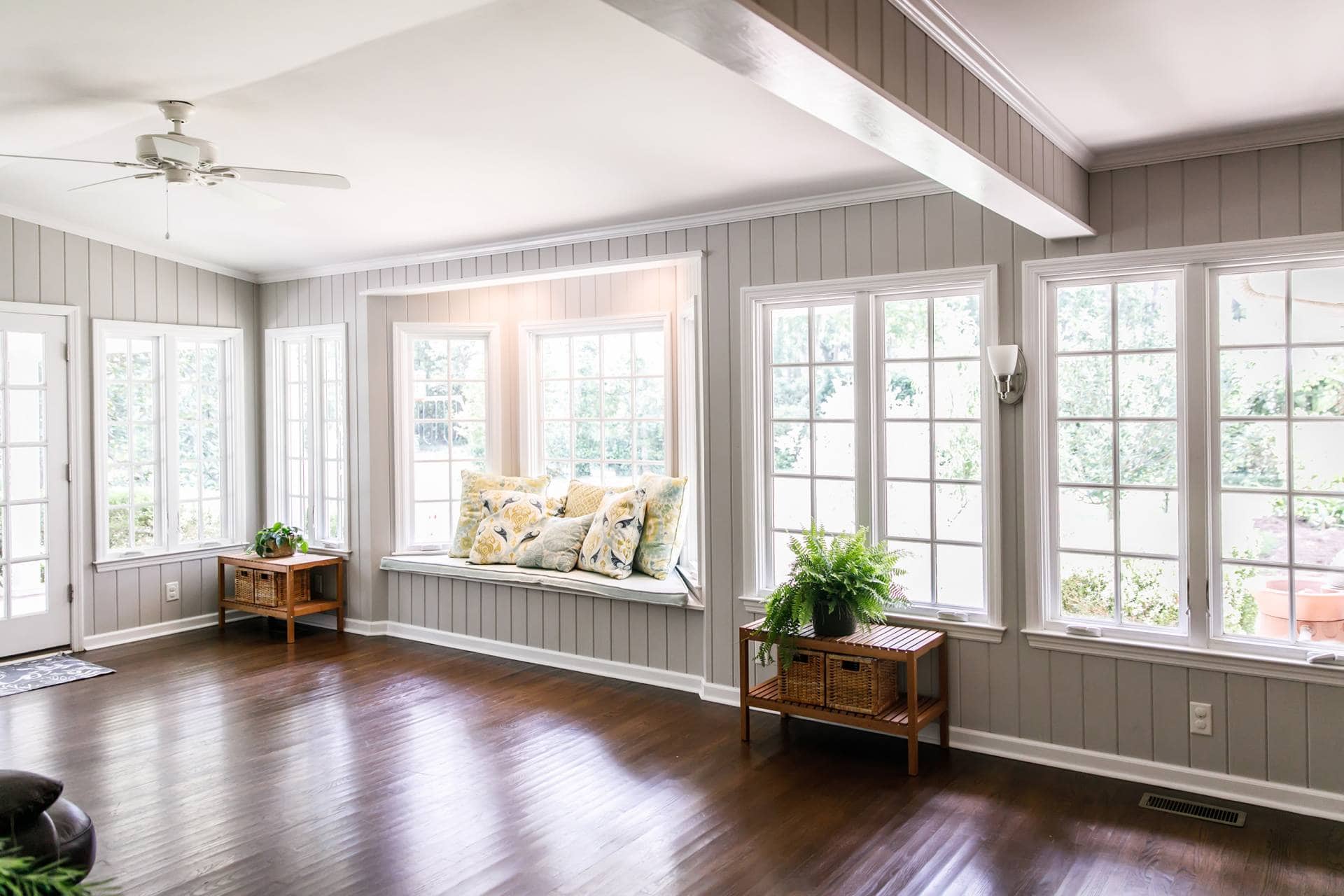 Bay window with gray shiplap wall