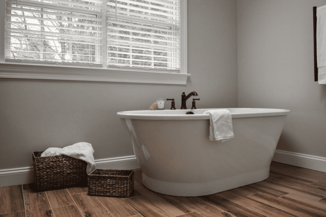 Grand soaking tub by window
