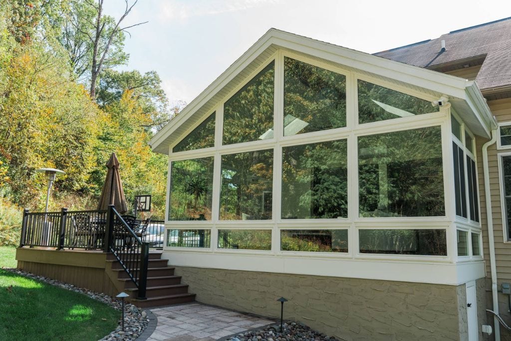 Contemporary sunroom exterior with cathedral windows