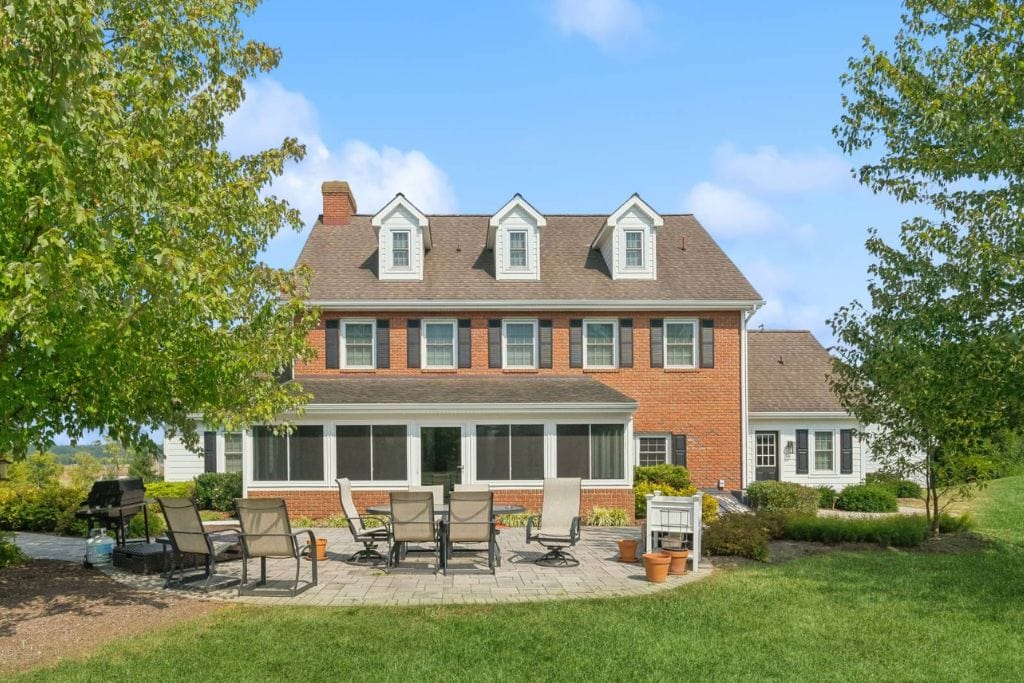 Home exterior with contemporary sunroom