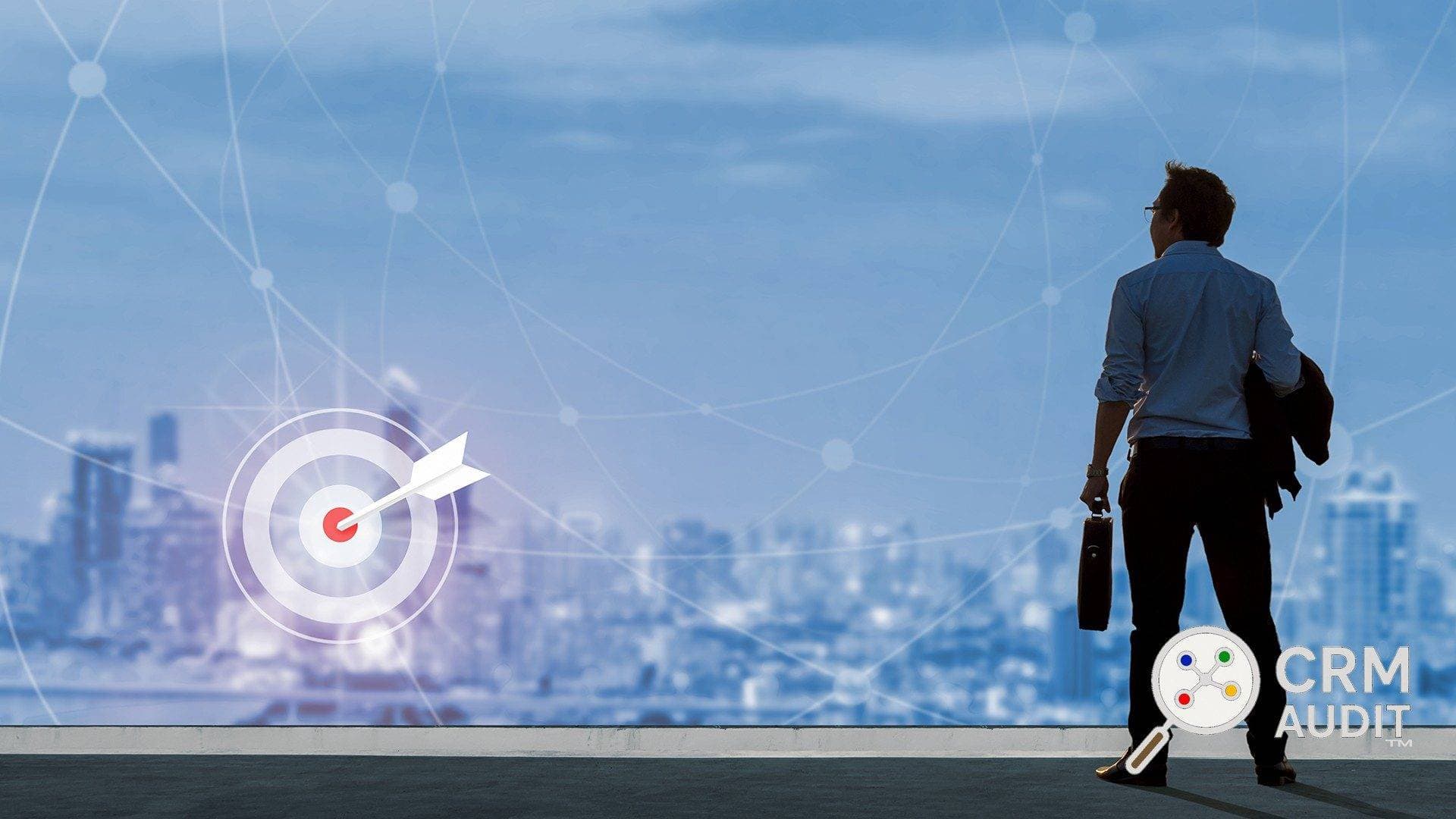 Man looking out of a large picture window over a city, with a superimposed target.