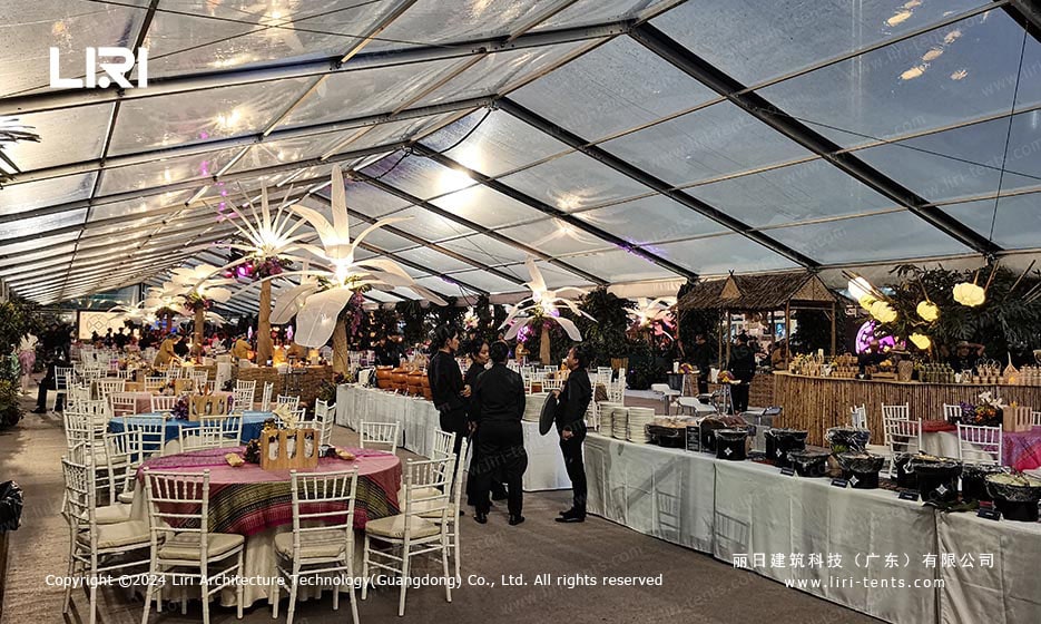 Gala banquet setup inside large clear span event tent