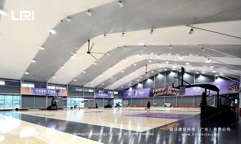 Full basketball court spanning the clear span interior