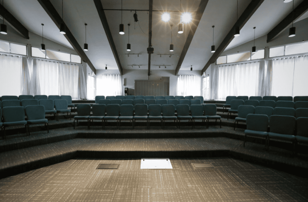 Inside a meeting space with chairs set up