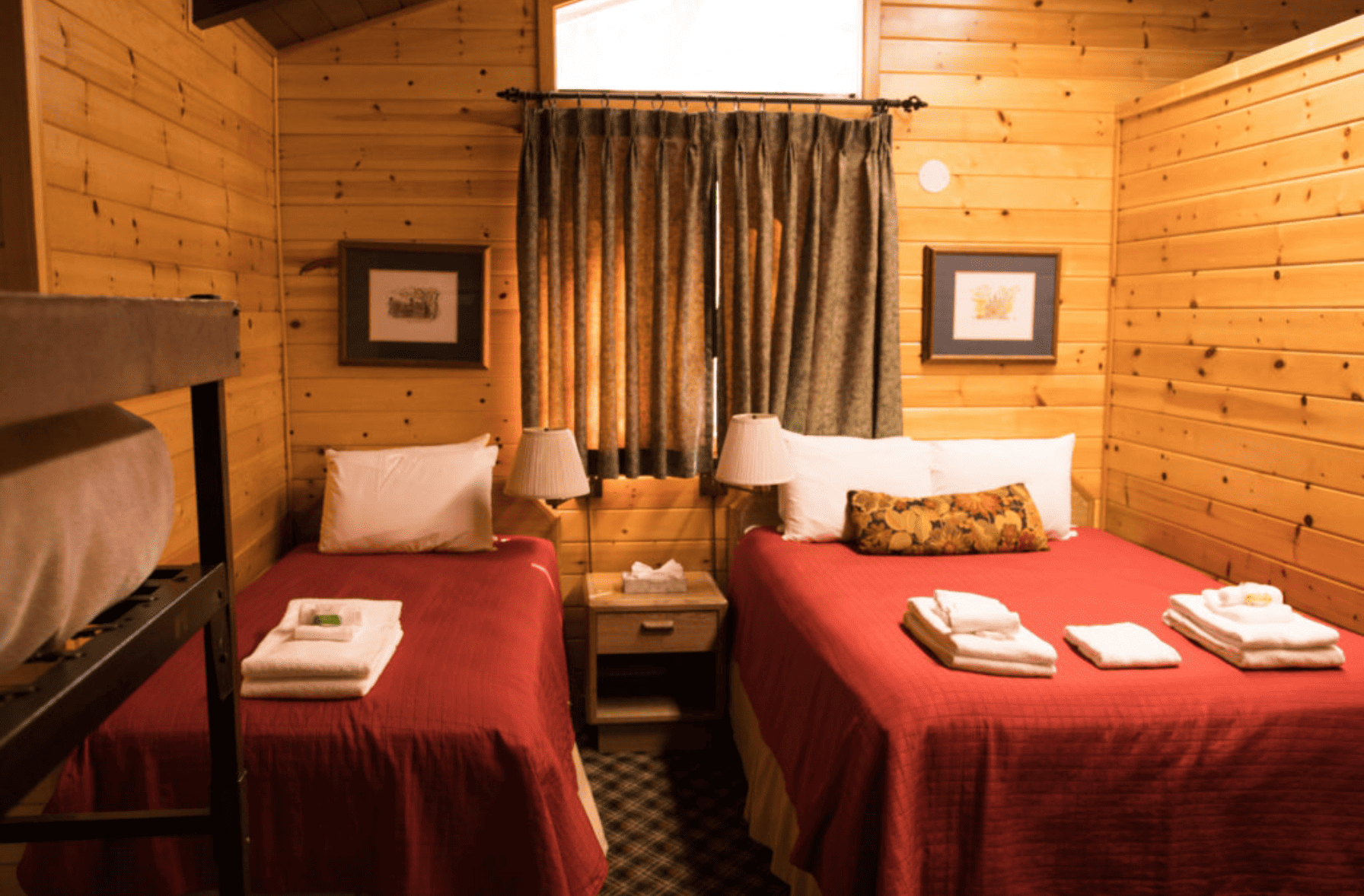 Two double beds in a bedroom