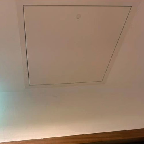 A trapdoor fire inspection hatch.