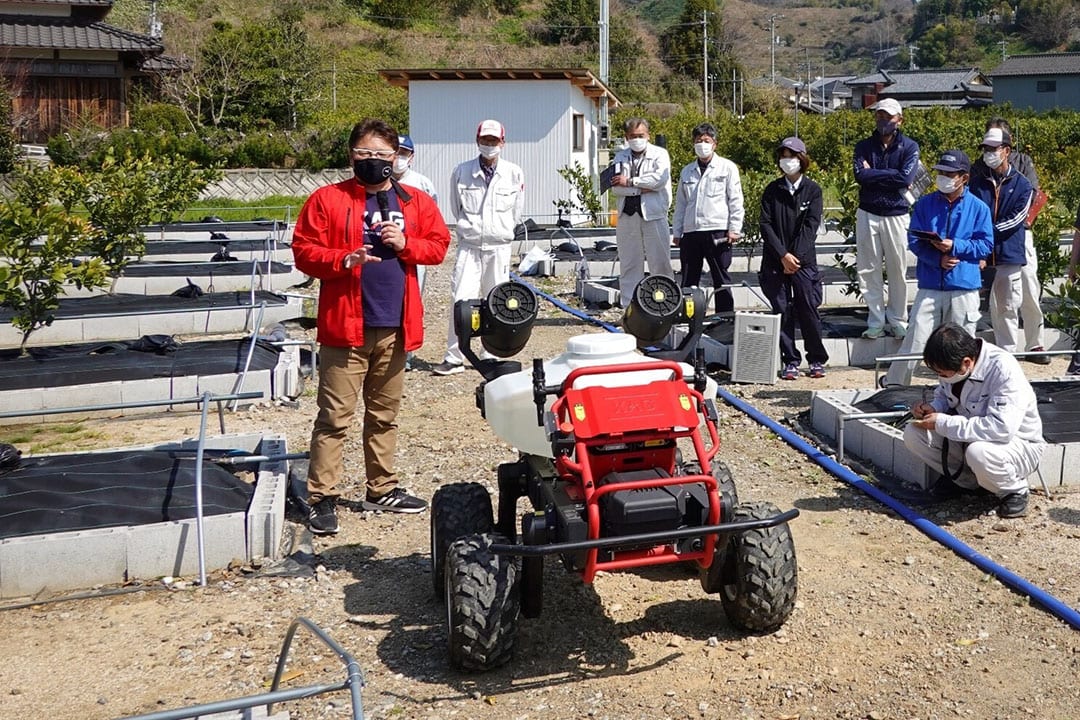 The XAG R150 Unmanned Ground Vehicle during a roadshow in Japan earlier this year, spraying mandarin oranges. - Photo: XAG