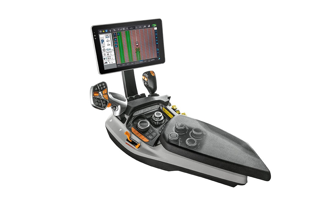 The Multicontroller III armrest incorporates a redesigned multi-function Multicontroller lever, customizable controls including remote valve paddles with LED colour indication and the new ISOBUS-compatible Infomat 1200 touchscreen monitor. - Photo: Steyr