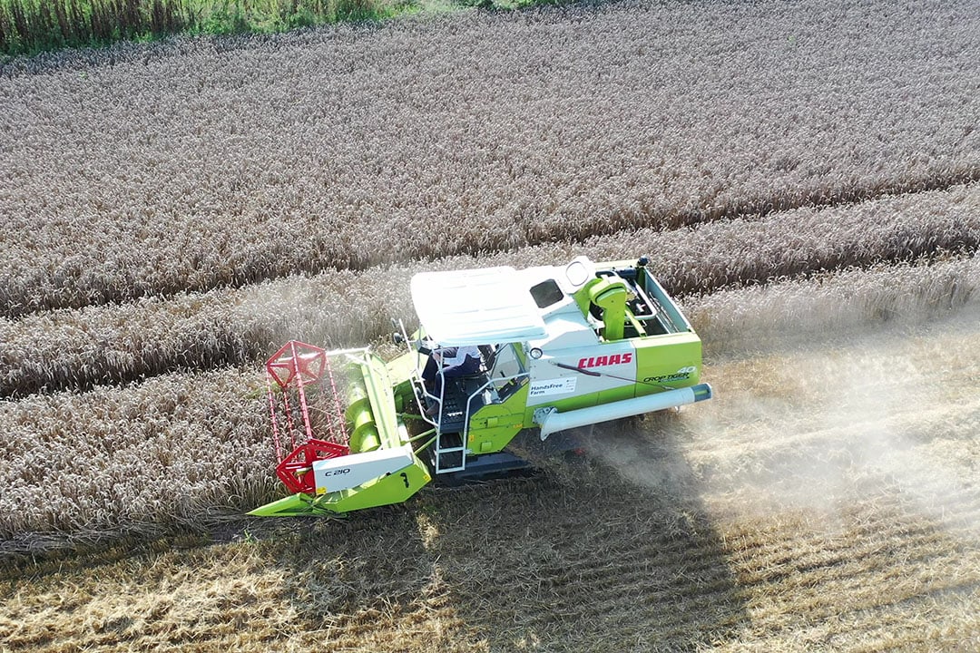 Smaller, autonomous and smart machines, like this Crop Tiger 40 combine on Terra Tracs with 2m wide header, can cut compaction as well as increase precision and efficiency. - Photo: harper Adams University