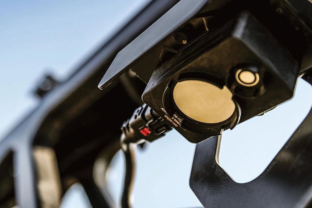 Cameras and processors mounted on the carbon-fiber truss-style boom utilise computer vision and machine learning to detect weeds from crop plants. - Photo: John Deere