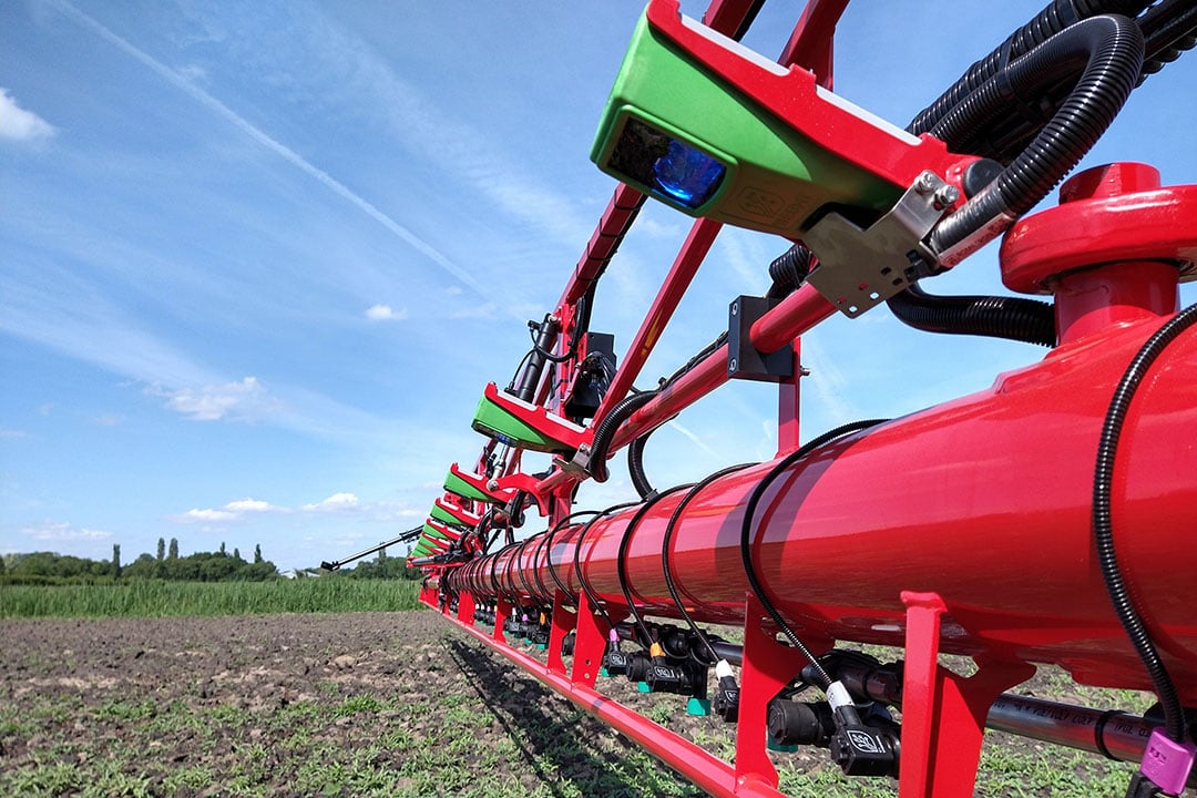 Optical spot sprayers use boom-mounted cameras/sensors detect weeds in apply targeted treatments in real time. Green on brown systems produce chemicals savings of up to 90%. - Photo: Mick Roberts