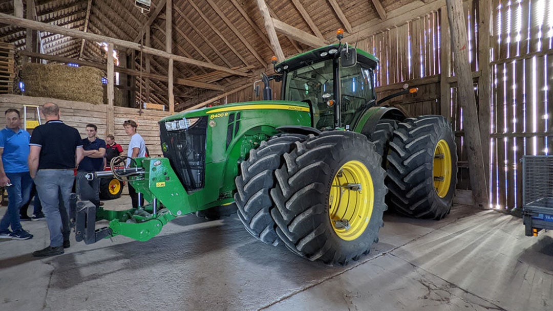 There’s three tractors in use on the farm, all John Deere and equipped with autosteer. Including this 8400 R that is parked in the original shed from 1890.