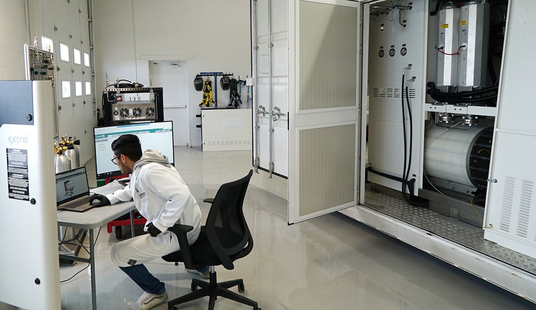 A FuelPositive technician observing the results from the mass spectrometer.