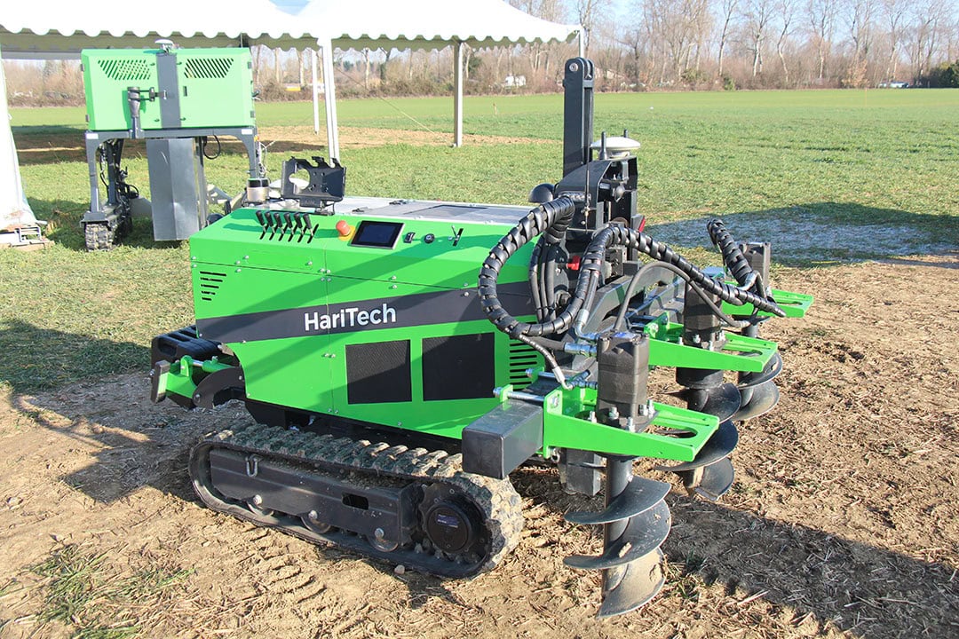 HariTech from Hungary presented two 25 hp diesel engine powered robotic carrier vehicles called Haribot designed for tree nurseries and plantations. The vehicle in the front is equipped with three drills/augers to drill holes for planting trees. Most Hungarian farmers still make these holes by hand. Both robots are for sale for € 75,000.