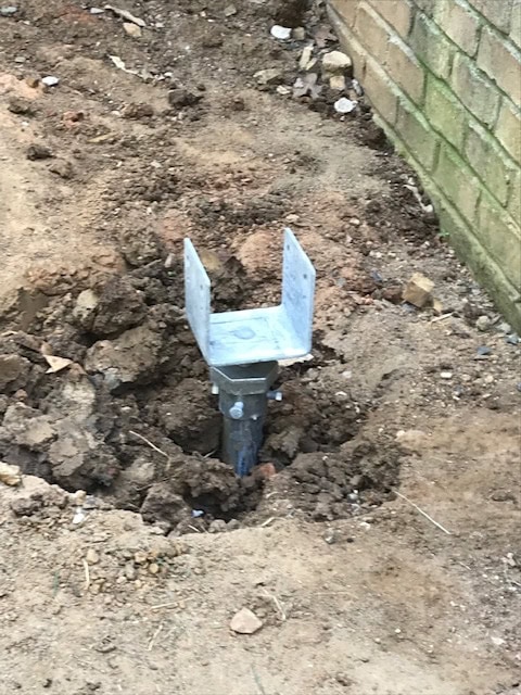 Helical pile ready for a 6 x 6 post in Charlotte