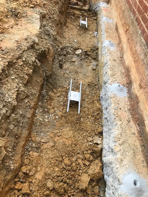 Helical piles when building close to an existing building, Charlotte