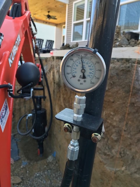 Monitoring torque while installing pile for a pool, Charlotte