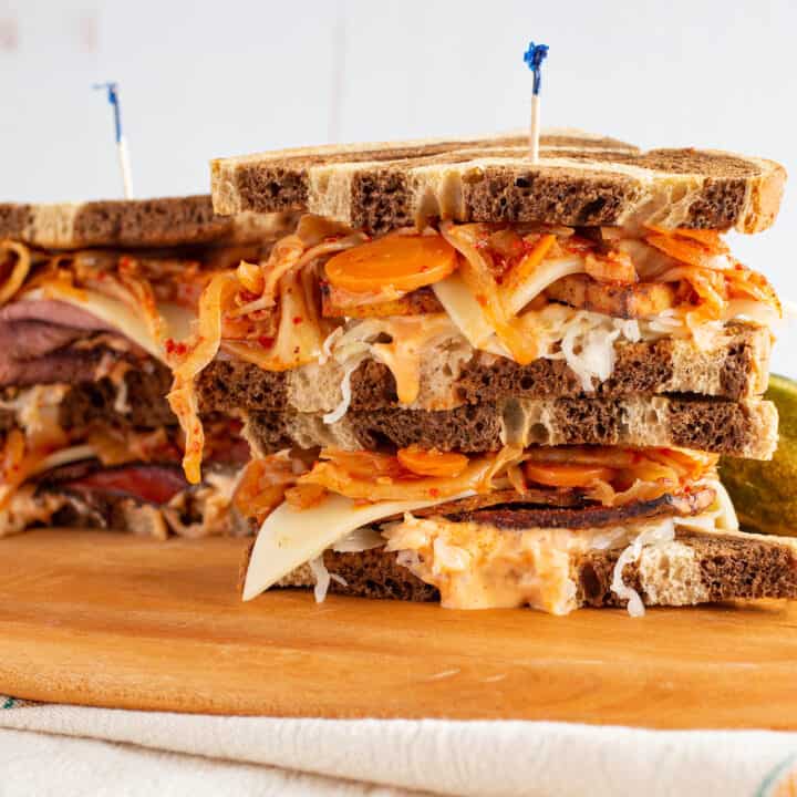 kimchi reuben sandwiches with tofu pastrami and regular pastrami