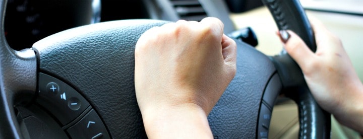 Woman honking horn. Woman honking horn.