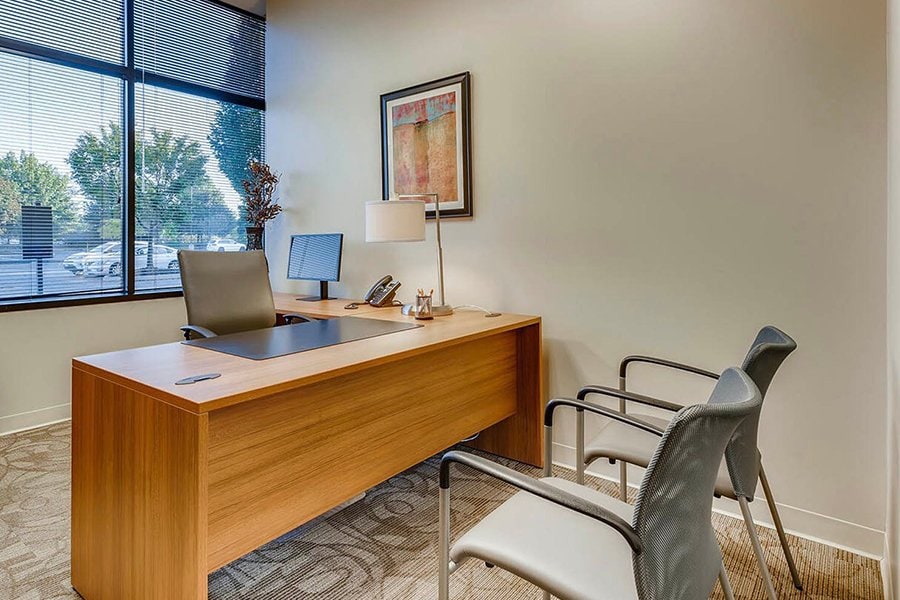 Conference room with office furniture and large window SEO-friendly office space.