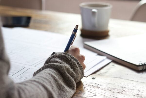 Person checking off things before moving abroad