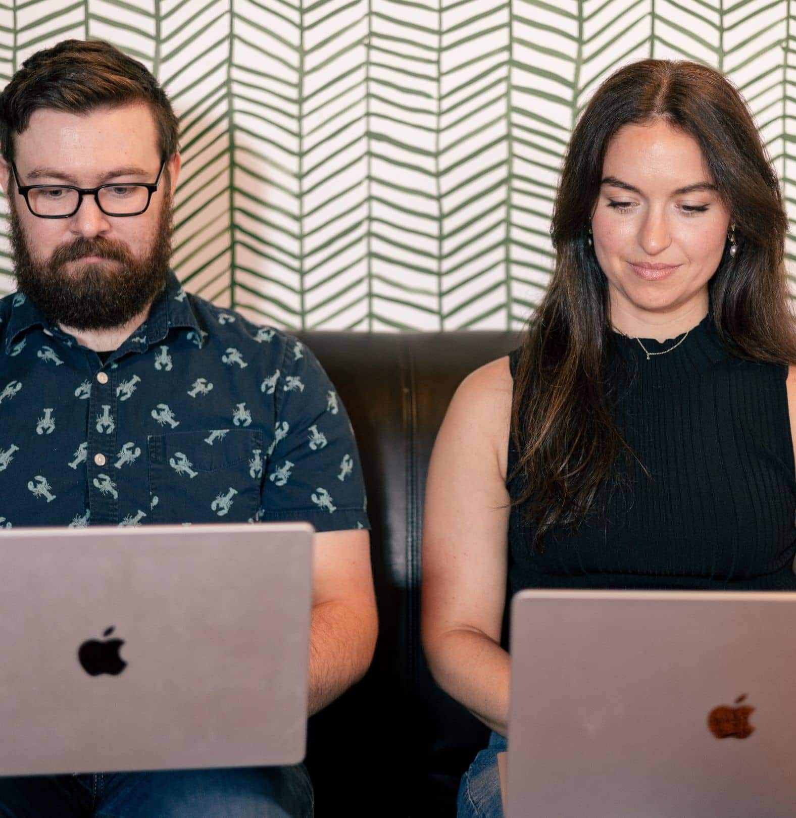 Push10 branding agency strategy team working on laptops in office