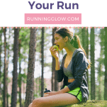 female runner eating apple in forest