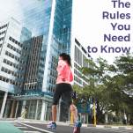female runner crossing a city street