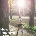 female running on wooded trail