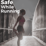 female runner stretching at night