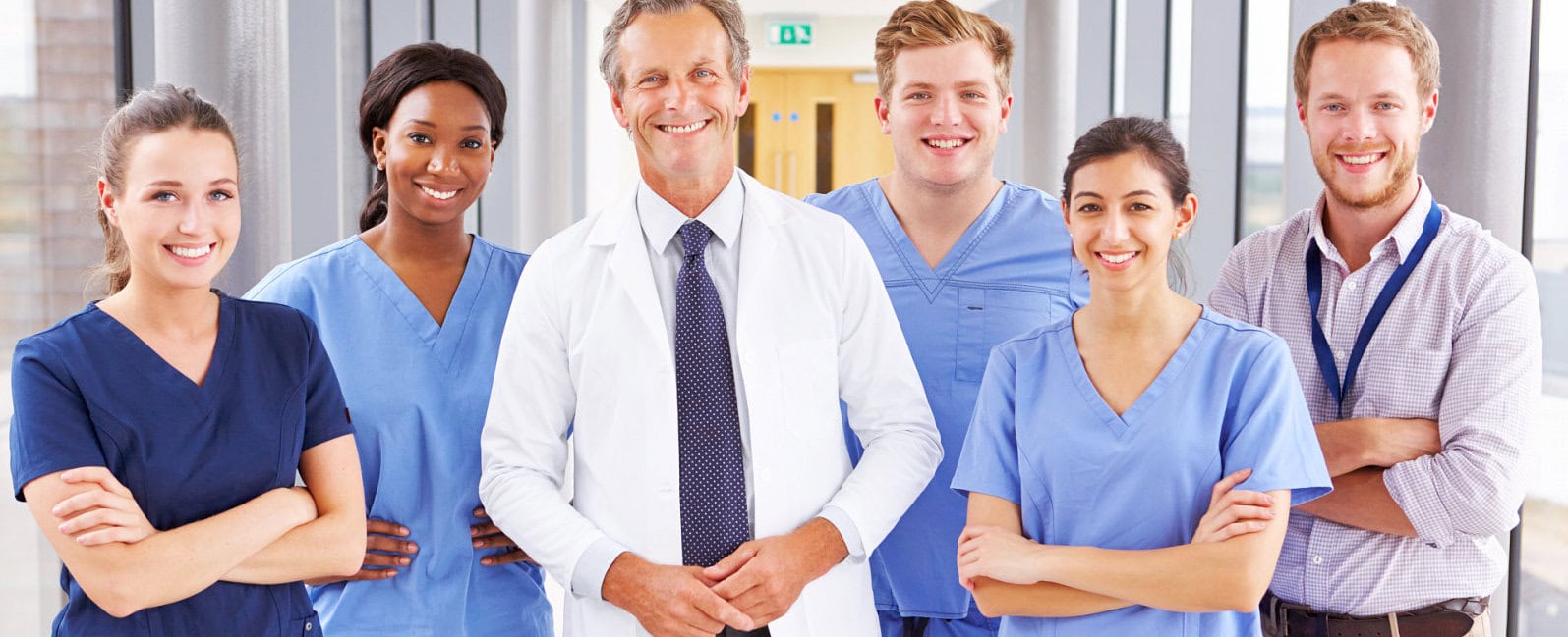 nurses and doctors standing